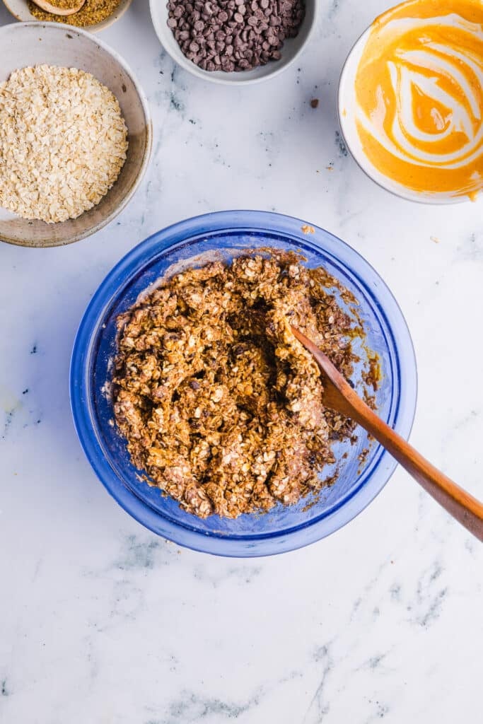 No bake protein cookie ingredients mixed in a mixing bowl.