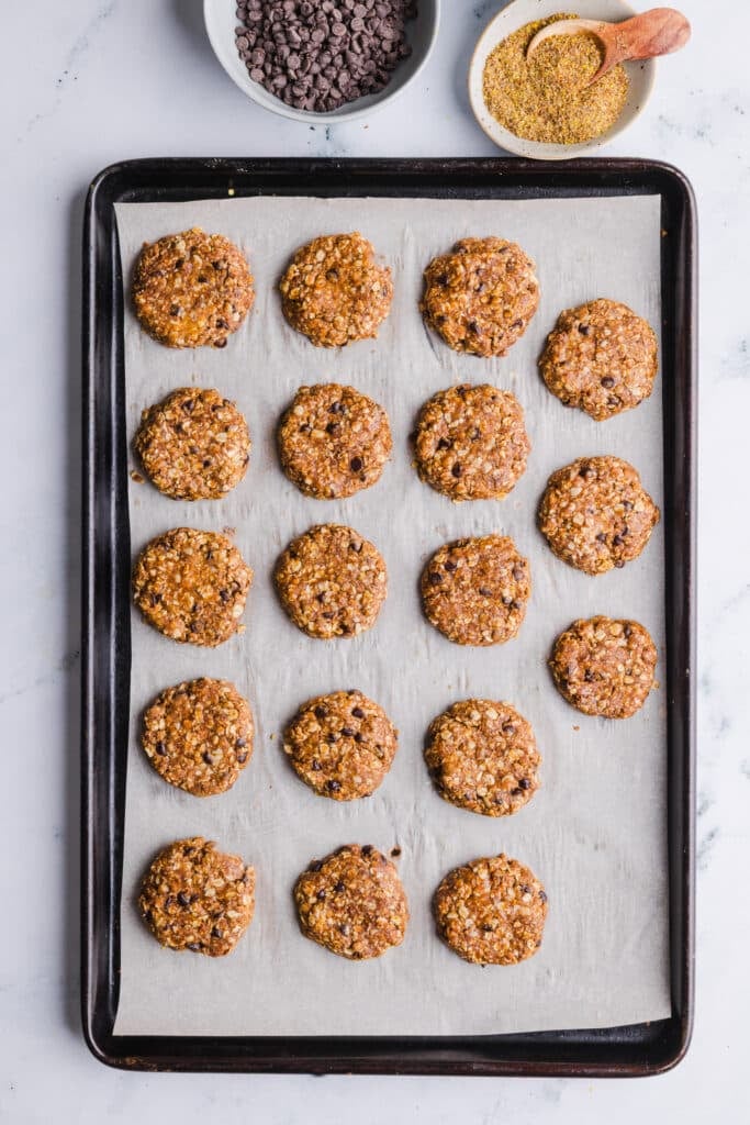No bake protein cookies on a sheet pan with parchment paper.