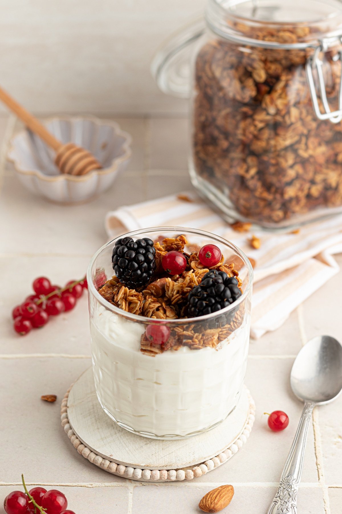 Vanilla nut granola in a parfait with yogurt and berries.