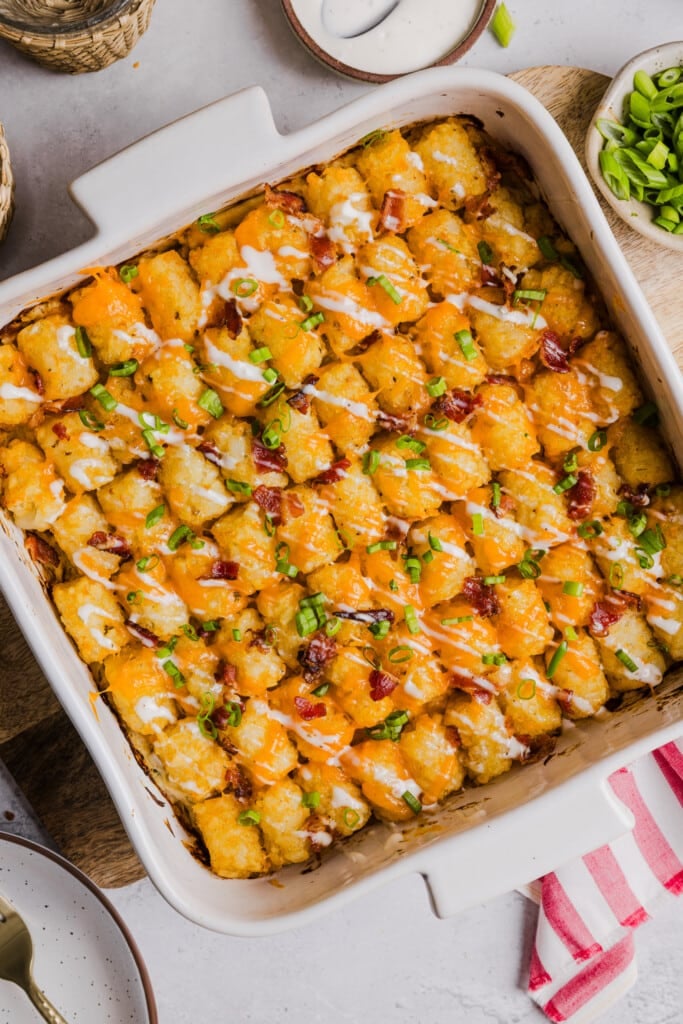 Chicken bacon ranch tater tot casserole baked in a dish.