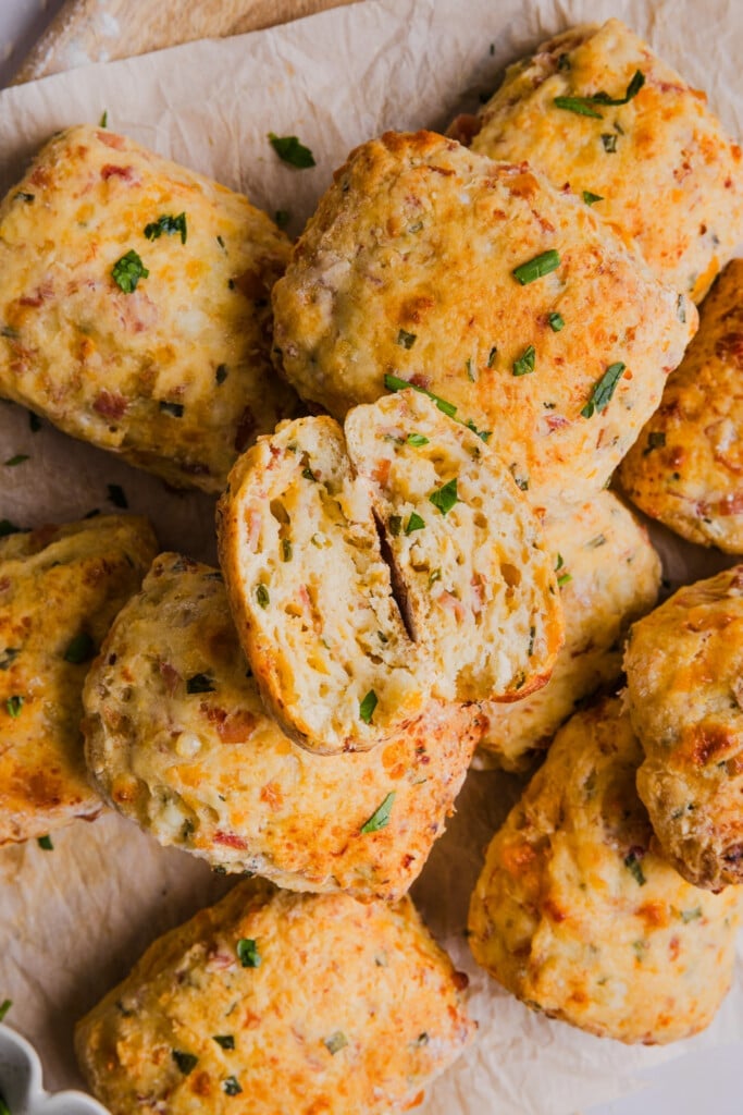 Protein biscuits with one sliced in half to show the inside.