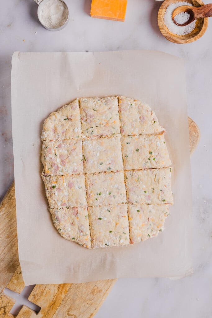 Protein biscuit dough sliced into 12 equal pieces