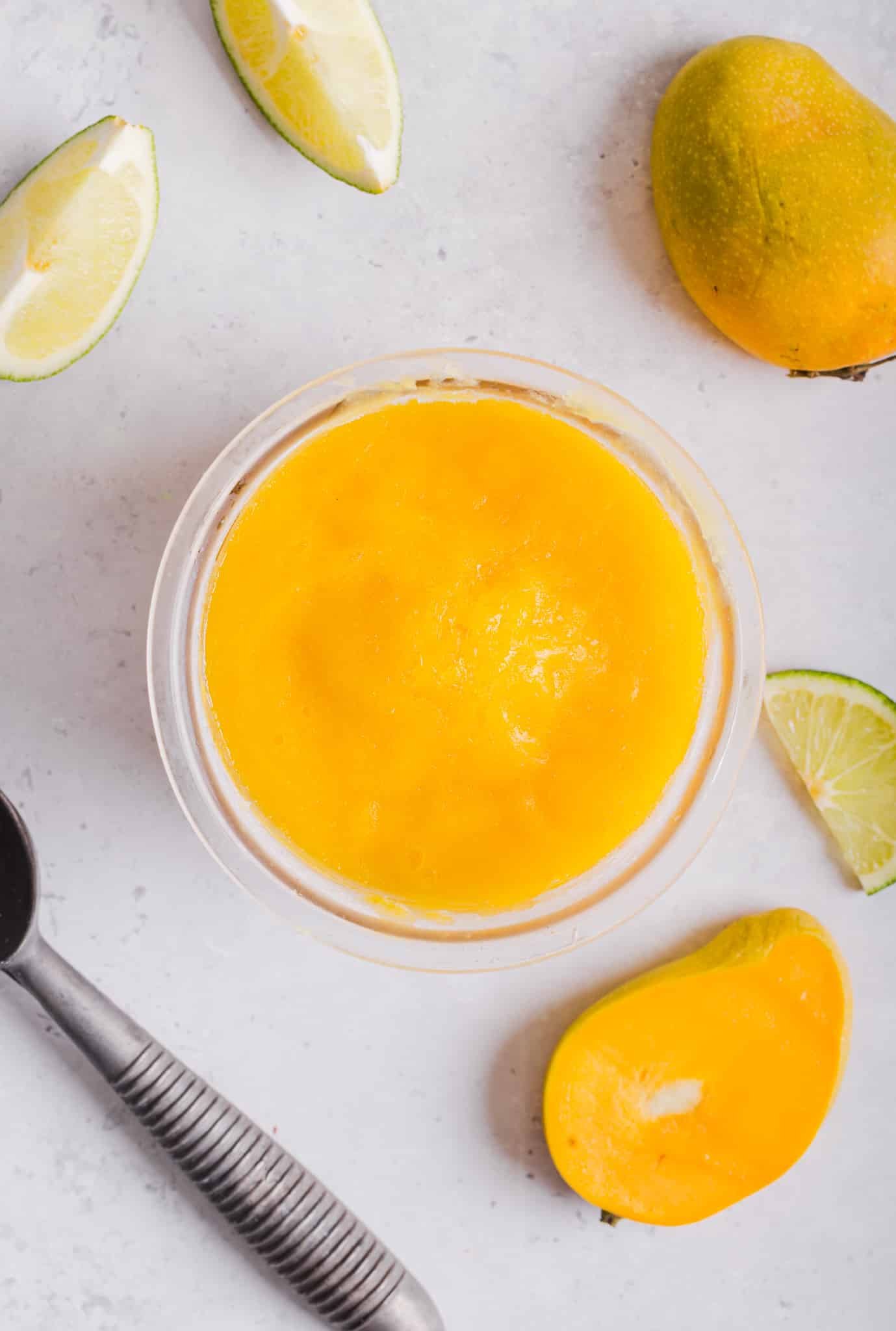 Lime juice is added to blended mango.