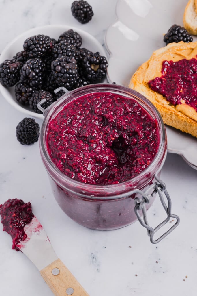 Blackberry chia jam in a mason jar.