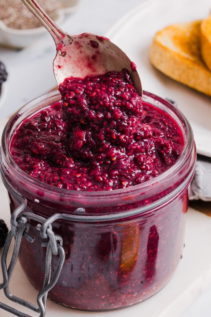 Blackberry chia jam in a mason jar.