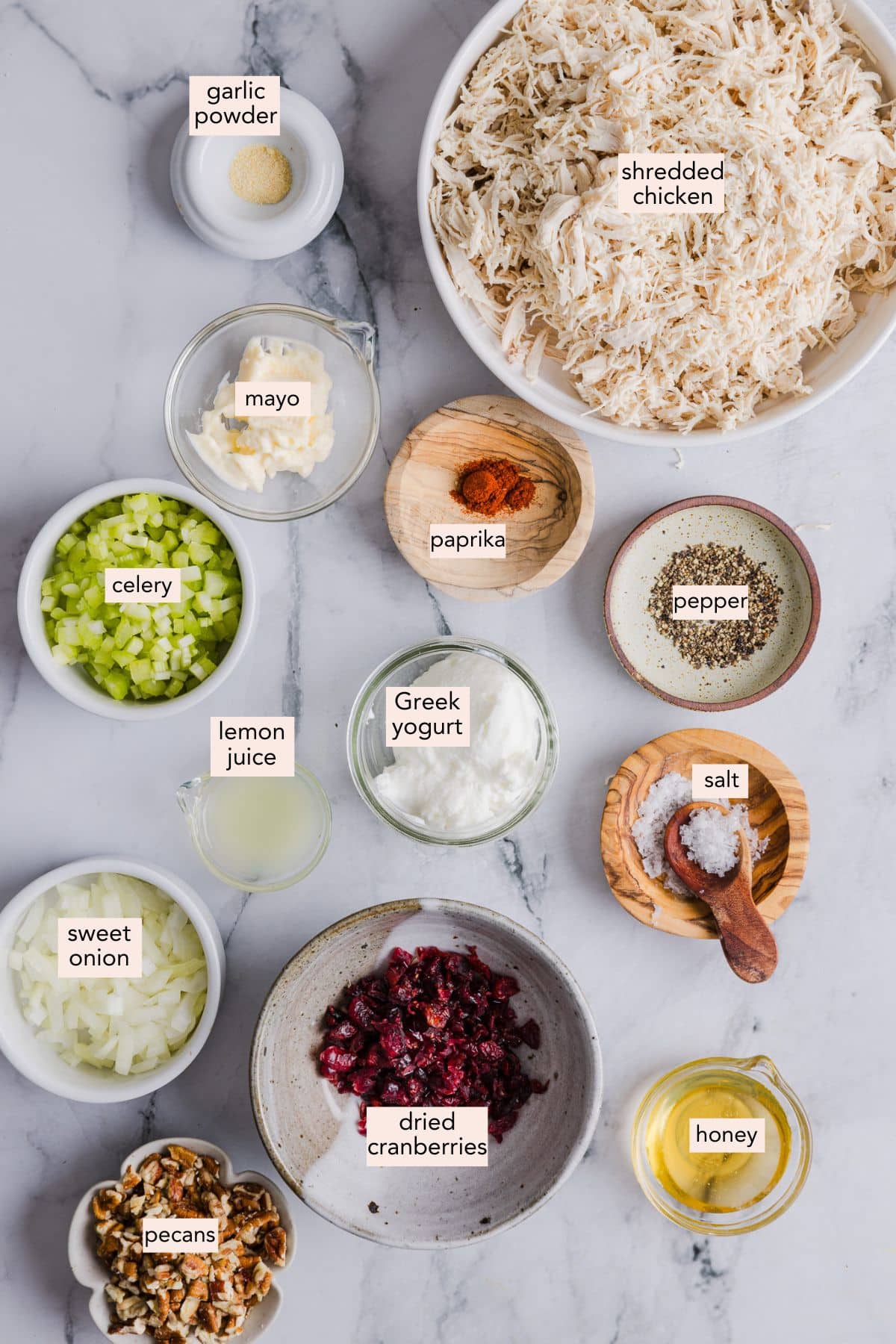 Labeled ingredients for Cape Cod chicken salad on a countertop.