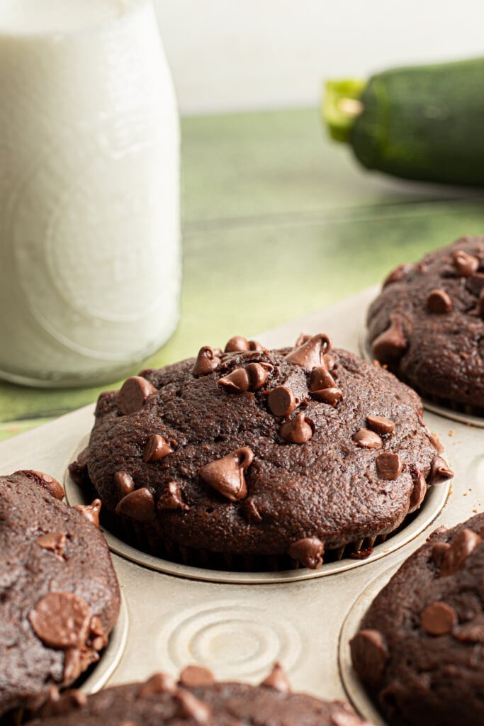 A chocolate veggie muffin in a muffin pan.