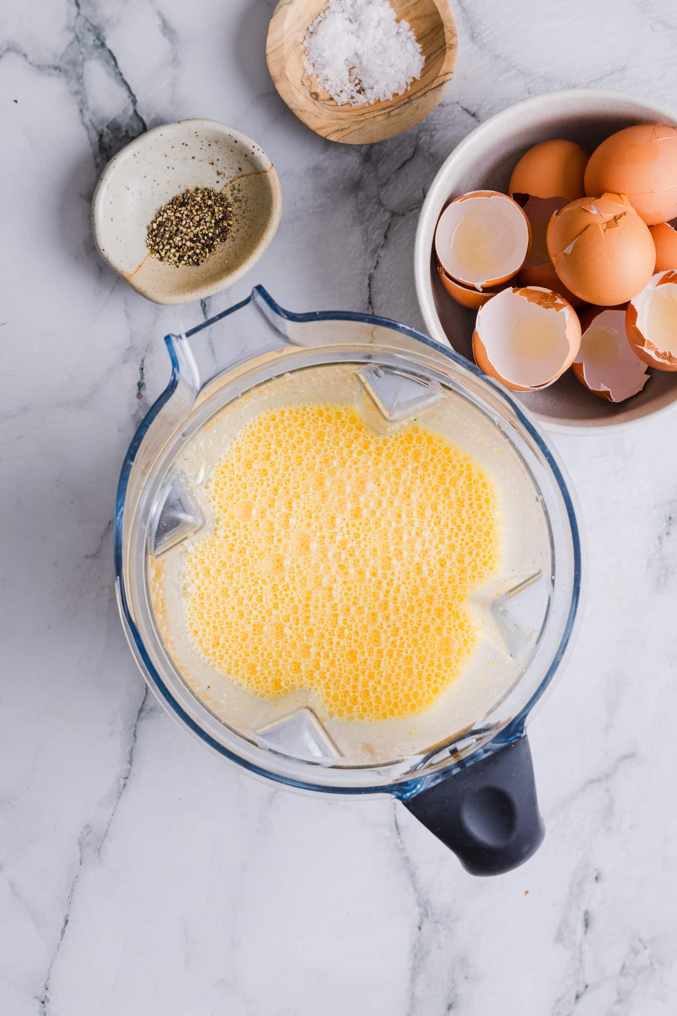 Cottage cheese, eggs and cheese blended in a blender.