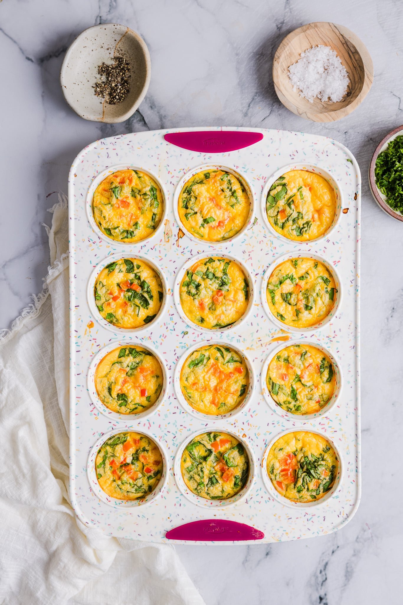 Cottage cheese egg bites with veggies baked in a silicone pan.
