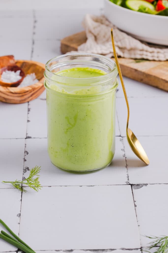 Poblano ranch dressing in a mason jar.