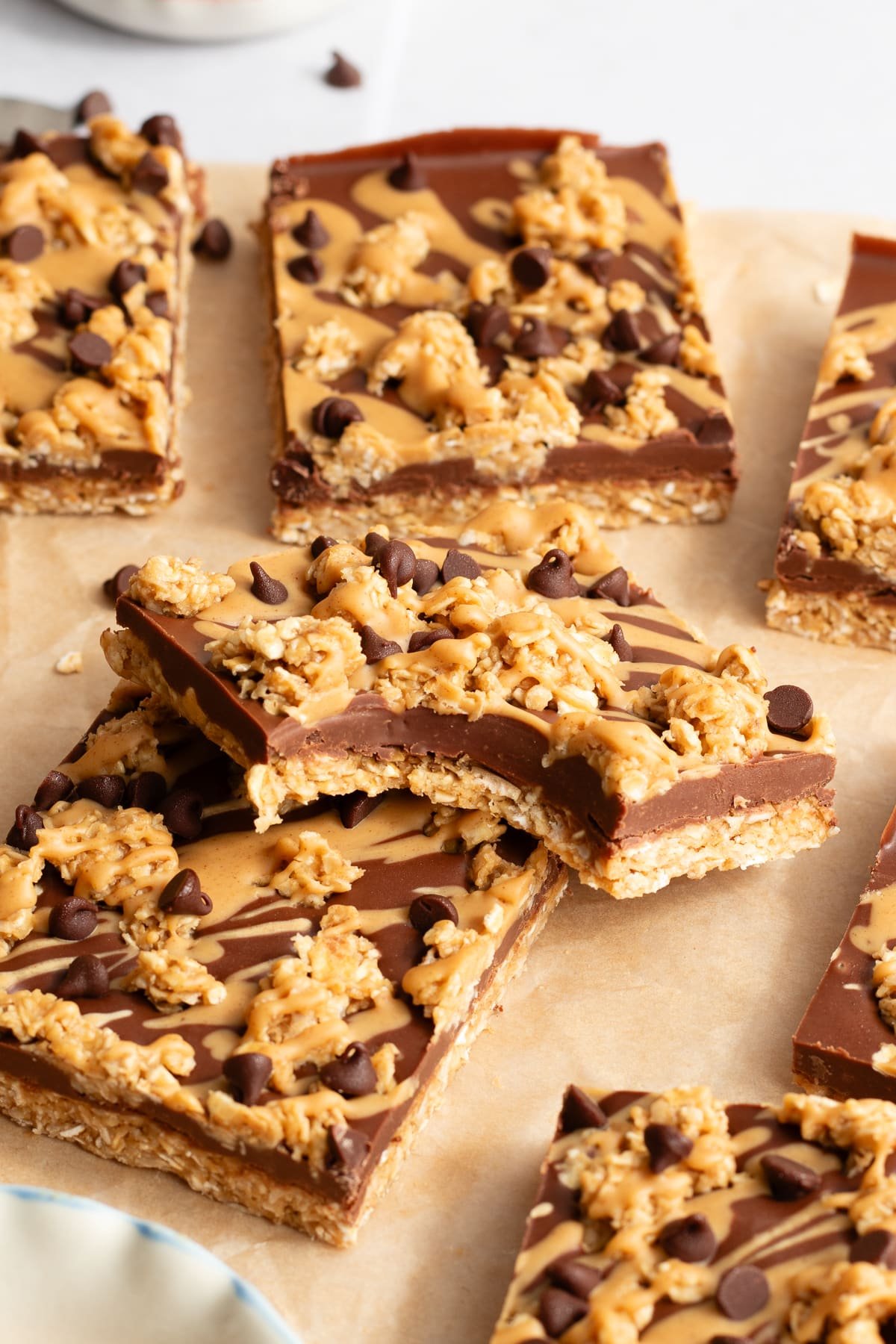 A no bake chocolate oat bar with a bite taken out.