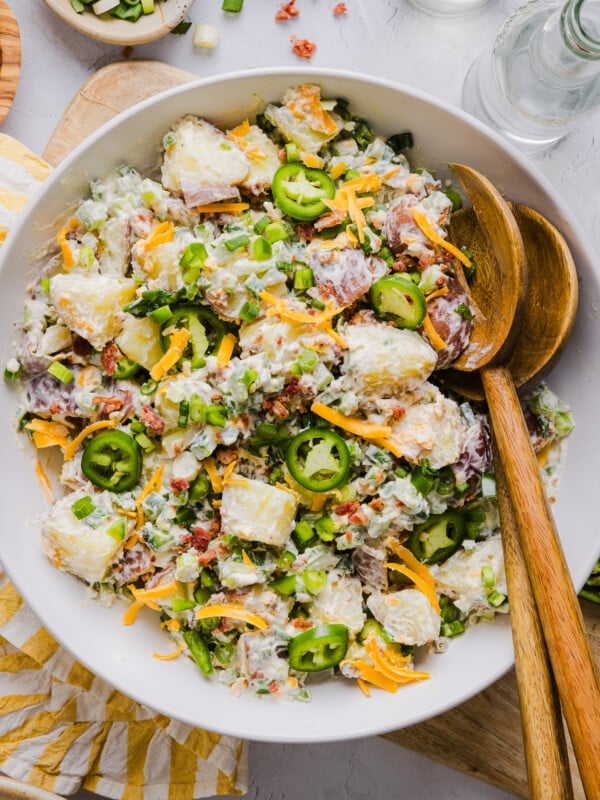 Jalapeño popper potato salad in a large white bowl.
