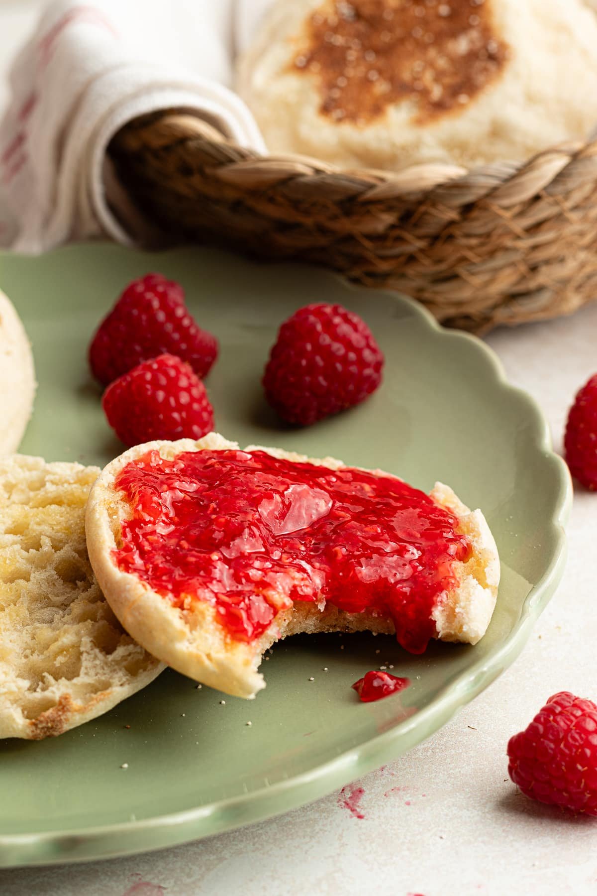 Raspberry freezer jam on an English muffin.