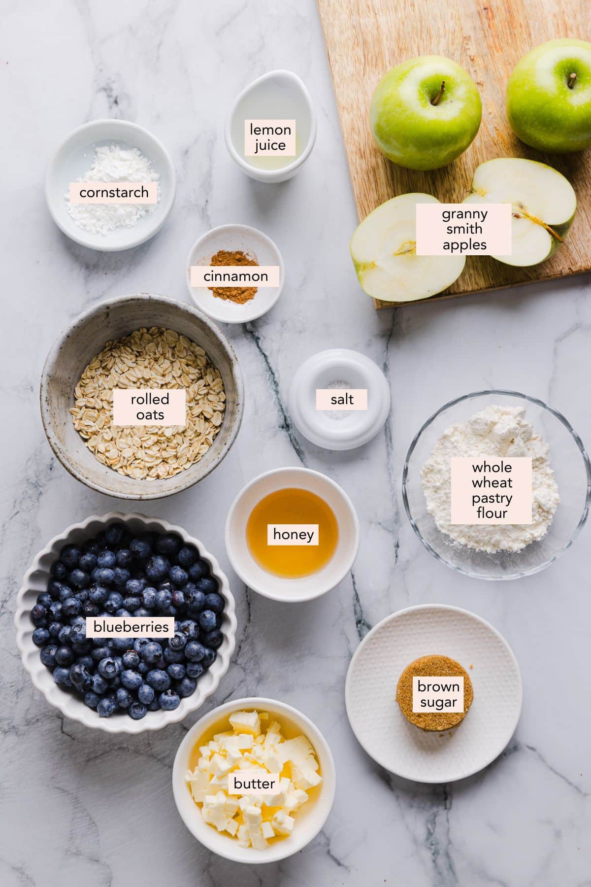 Labeled ingredients for apple blueberry crumble.