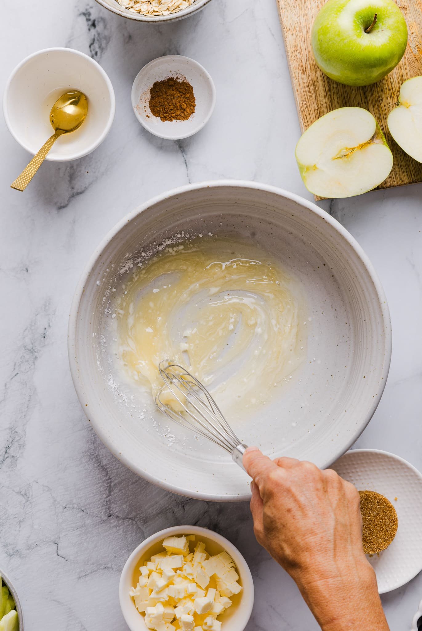 Whisking together honey, lemon juice, and cornstarch.