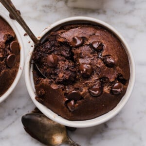 Chocolate baked oats in a white ramekin.