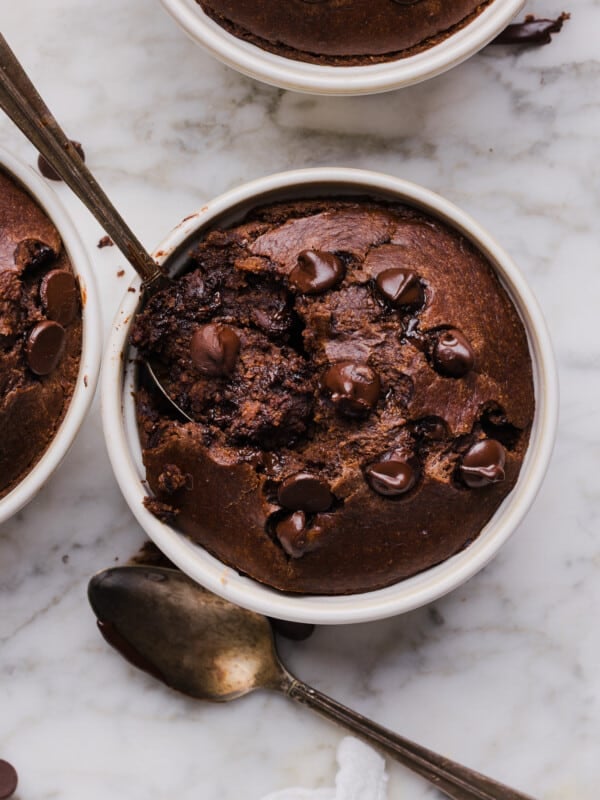 Chocolate baked oats in a white ramekin.