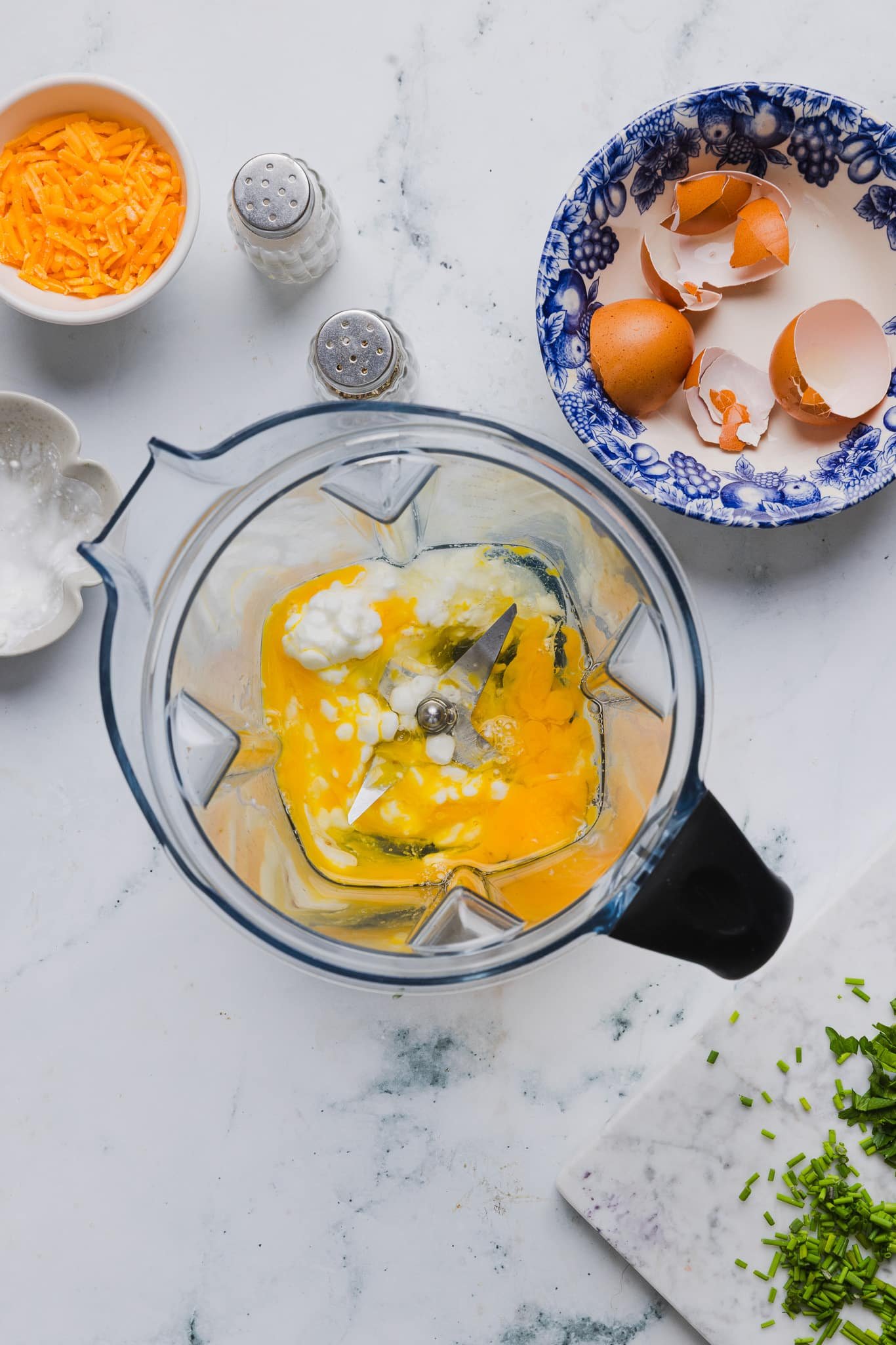 Eggs, cottage cheese, and salt in a blender.