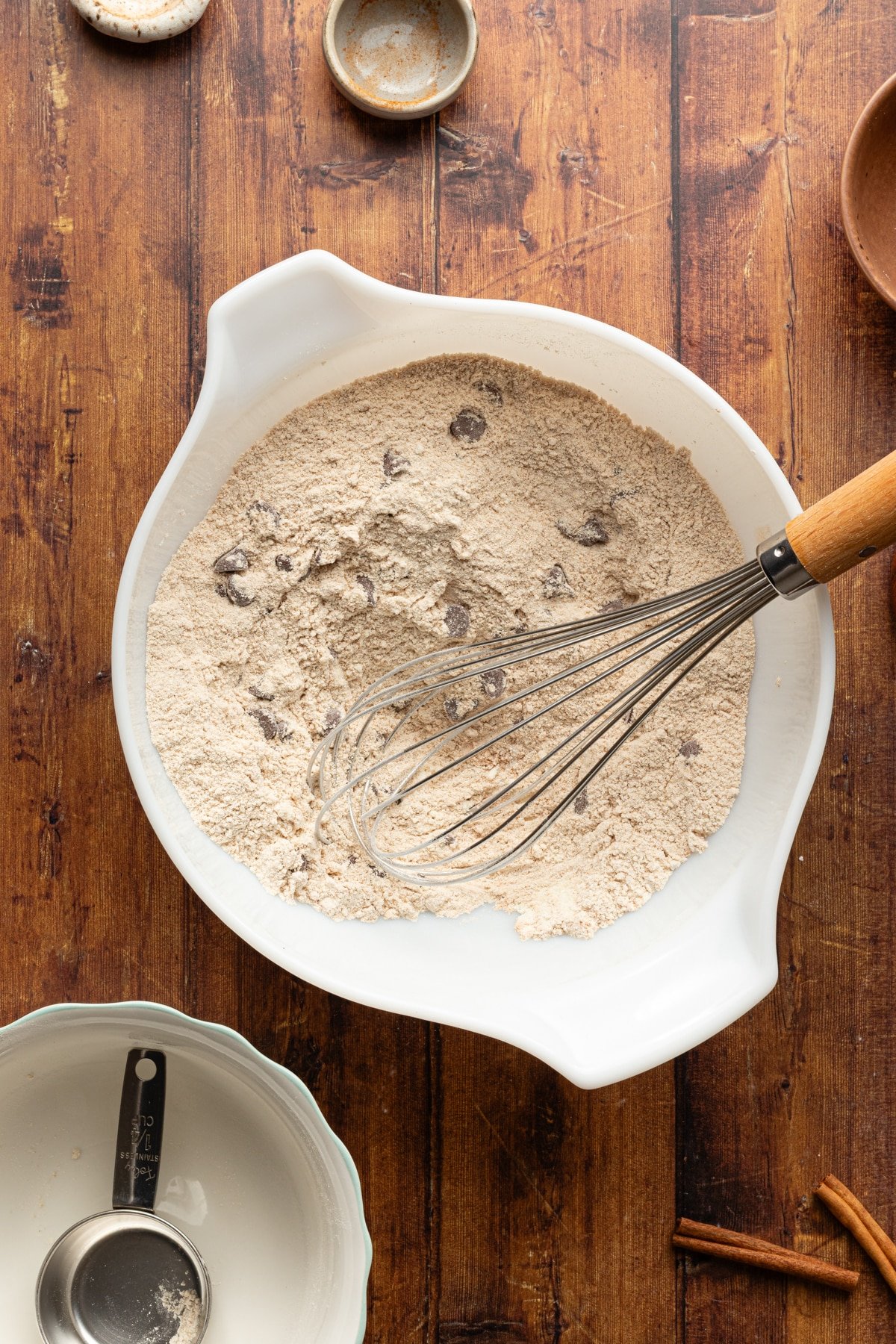 Dry ingredients for pumpkin protein bread being whisked together.