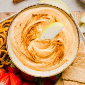 Overhead image of pumpkin fluff with an apple slice.
