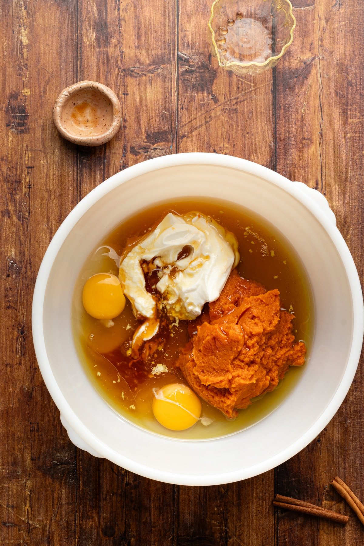 Wet ingredients for pumpkin protein bread in a bowl.