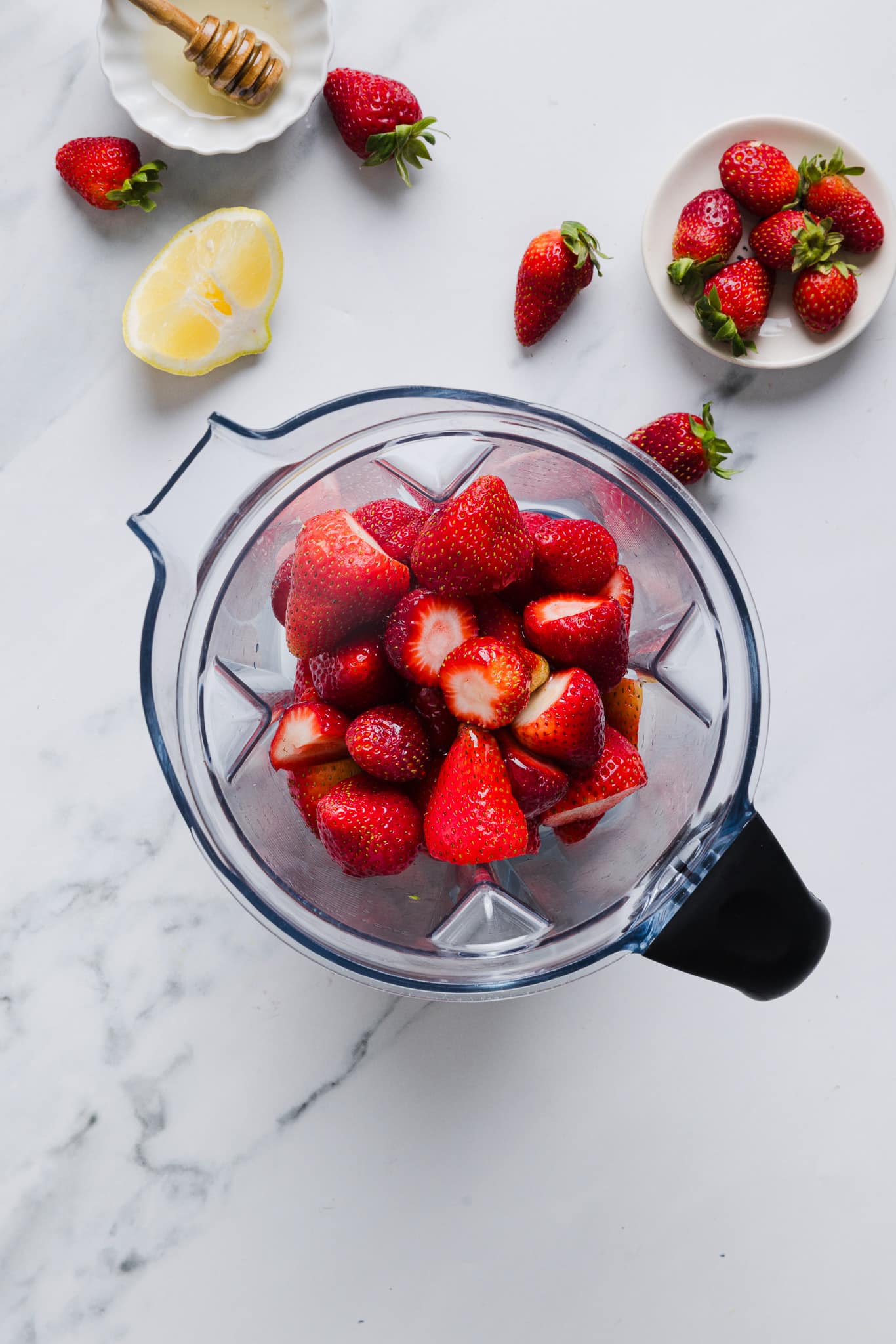 Strawberries in a blender.