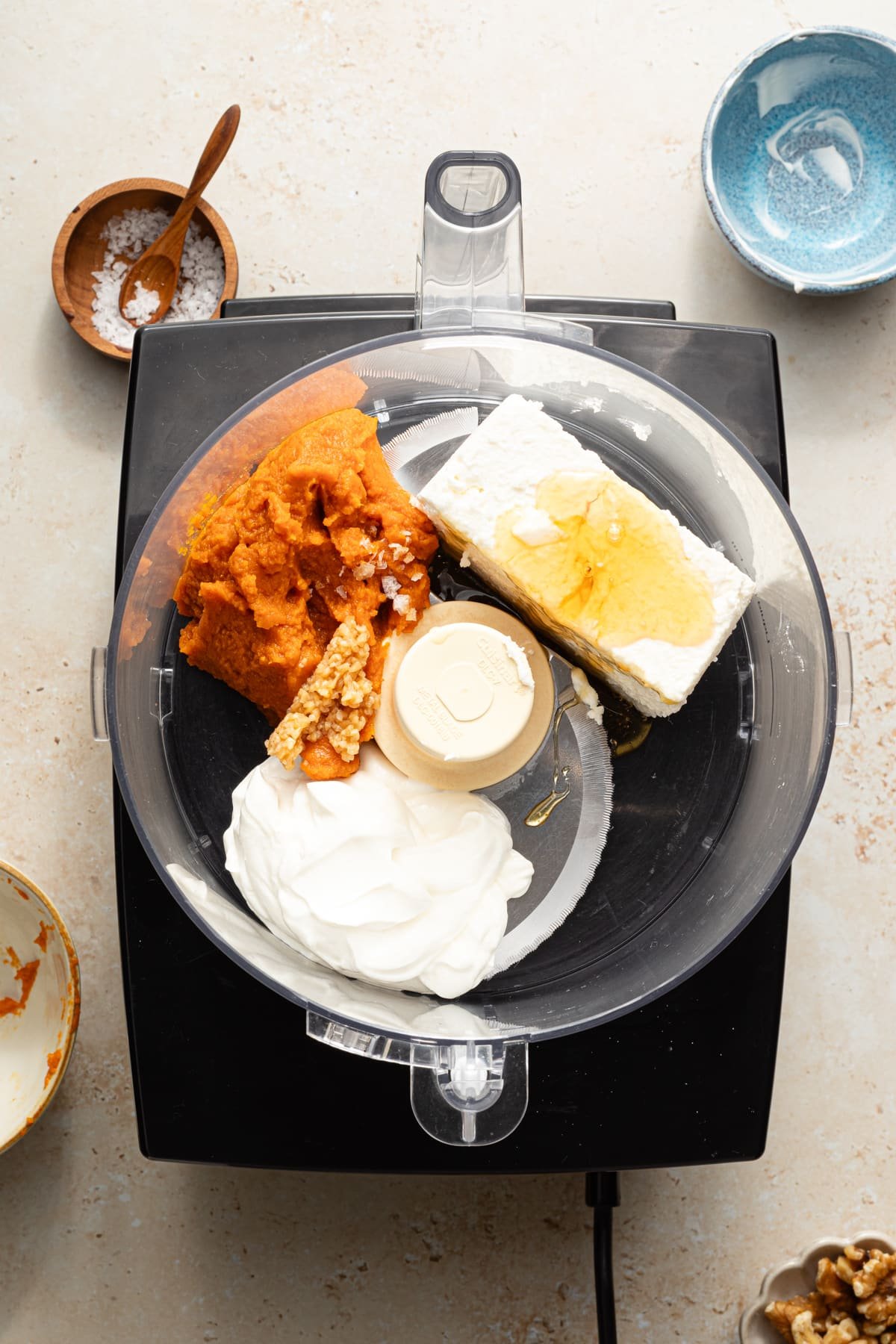 Feta dip ingredients in a food processor.