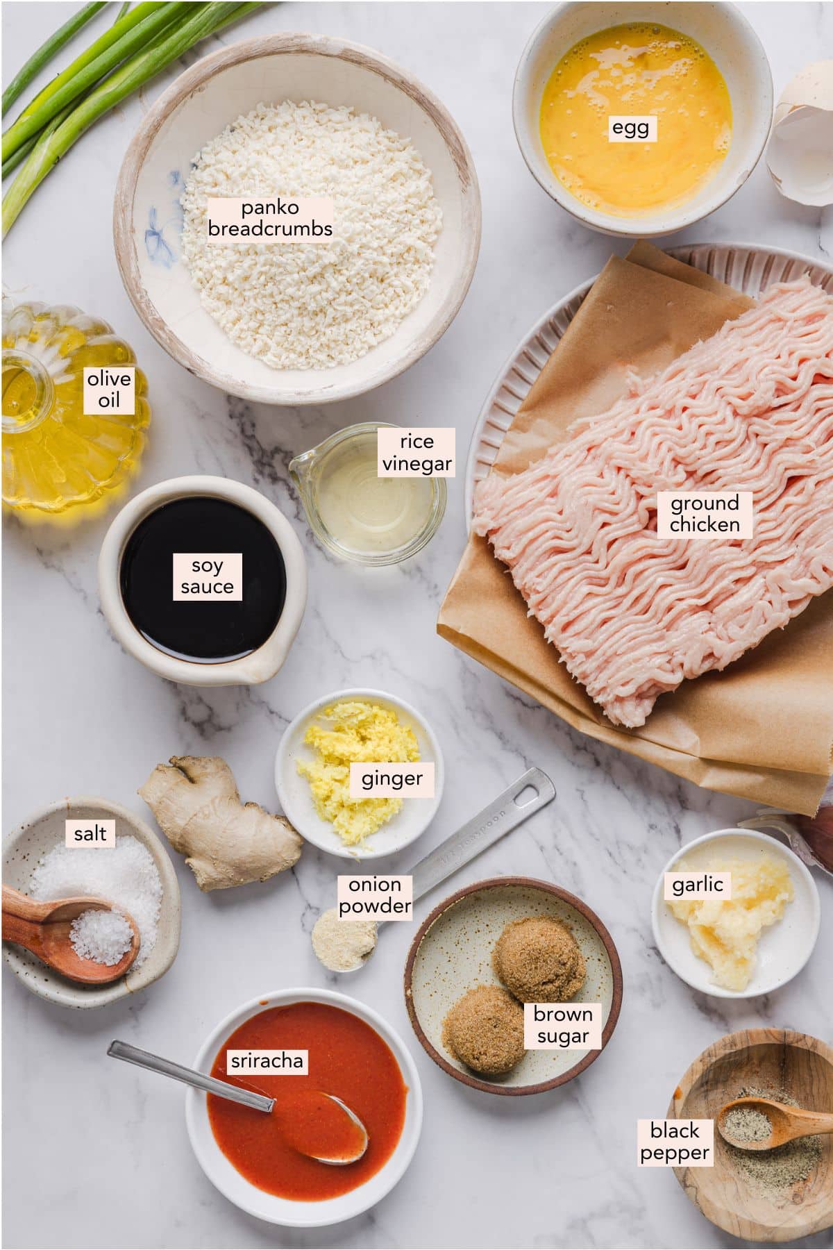 Firecracker chicken meatball ingredients on a counter in individual bowls.