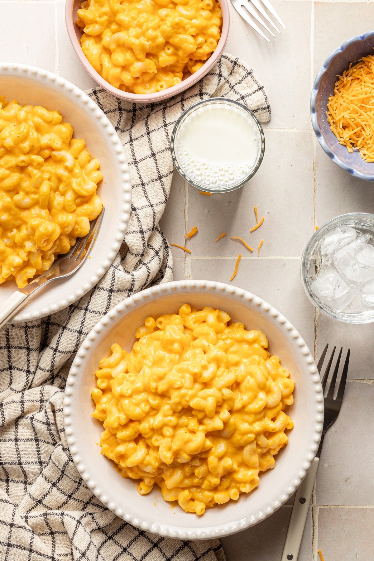 Hidden veggie Mac and cheese in white bowls.
