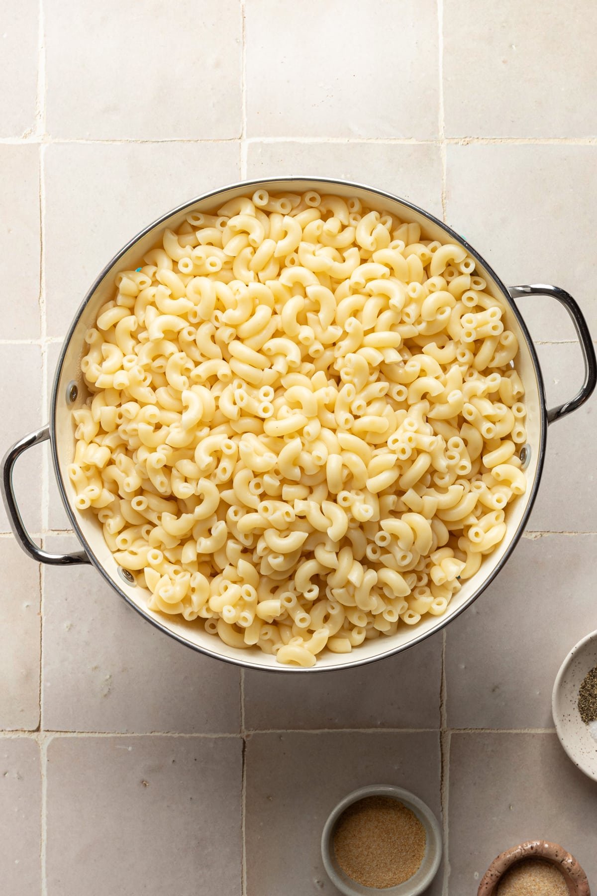 Cooked pasta in a colander.