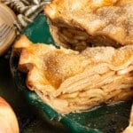 Healthy apple pie sliced in a pie dish.