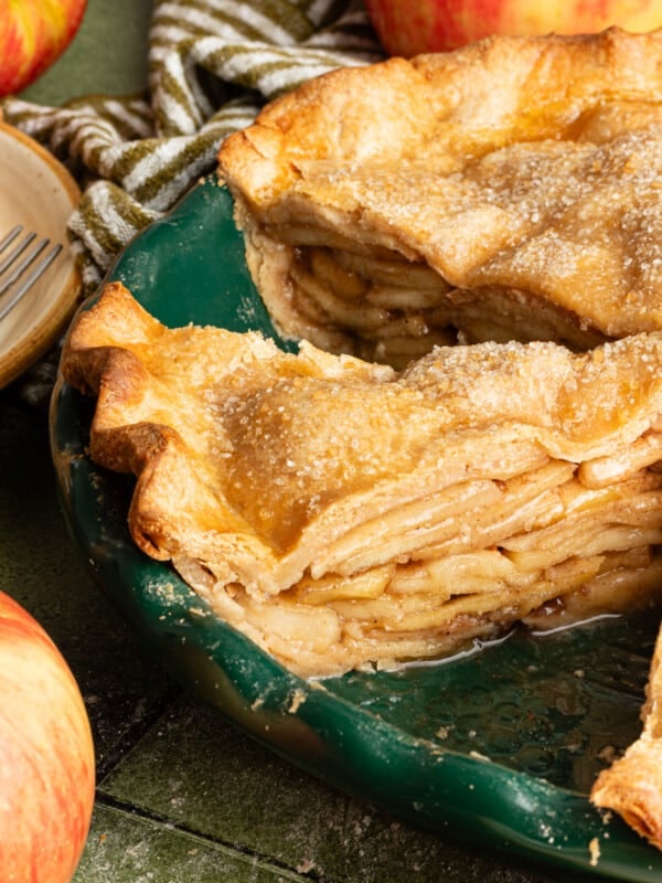 Healthy apple pie sliced in a pie dish.