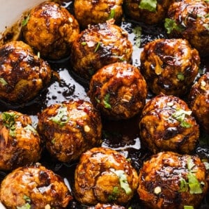 Firecracker chicken meatballs in a pan.