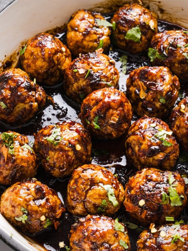 Firecracker chicken meatballs in a pan.