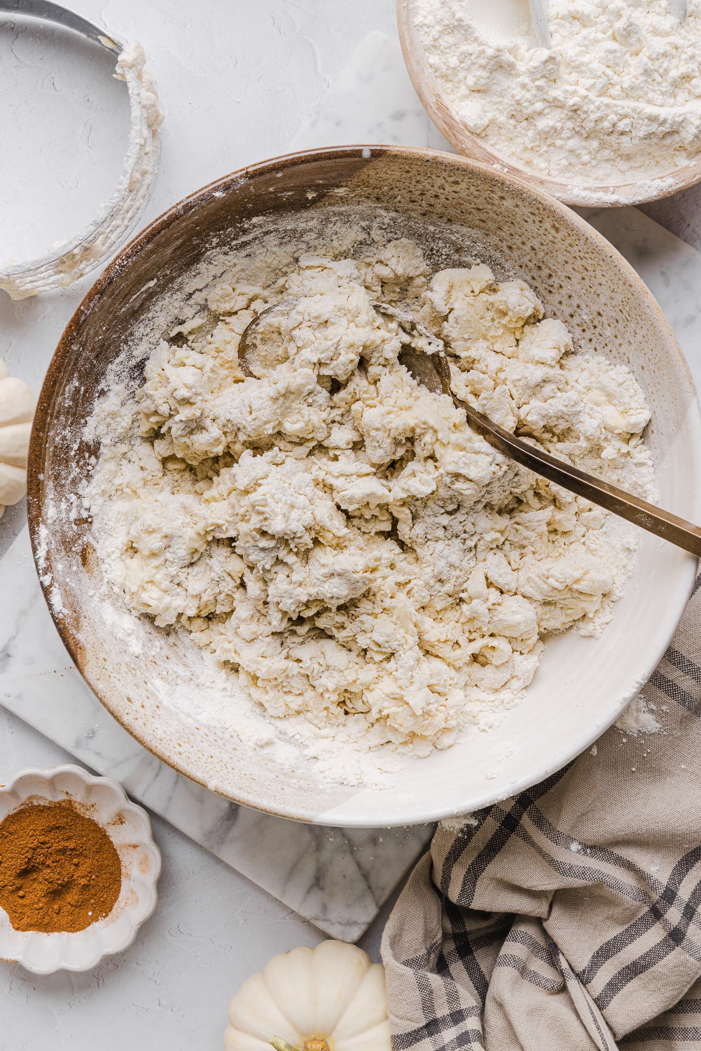 Healthy pie crust being mixed in a bowl.