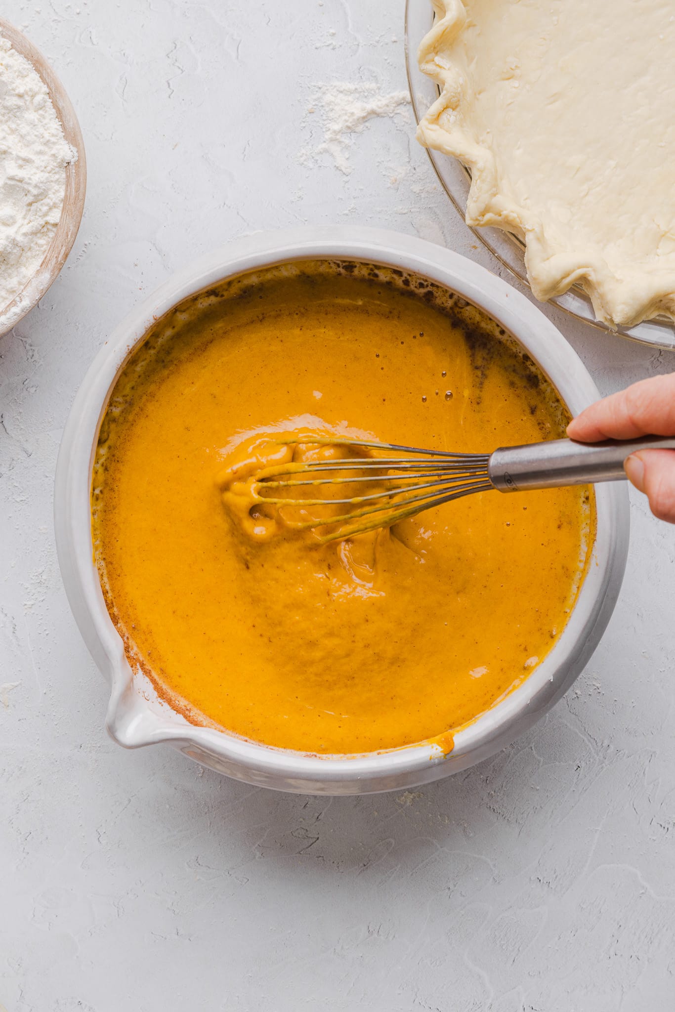 Healthy pumpkin pie filling mixed in a bowl.