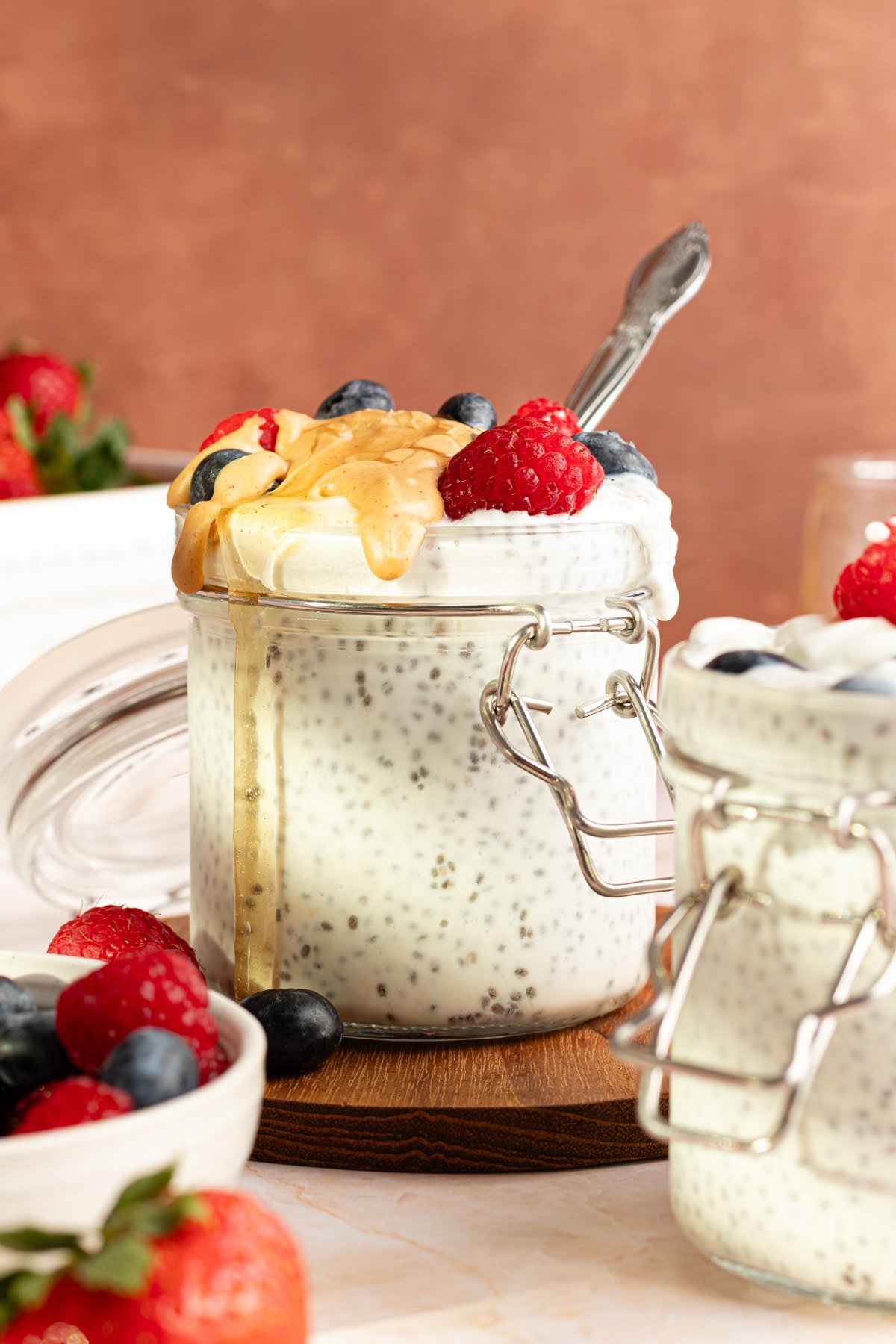Protein chia pudding topped with nut butter and berries.