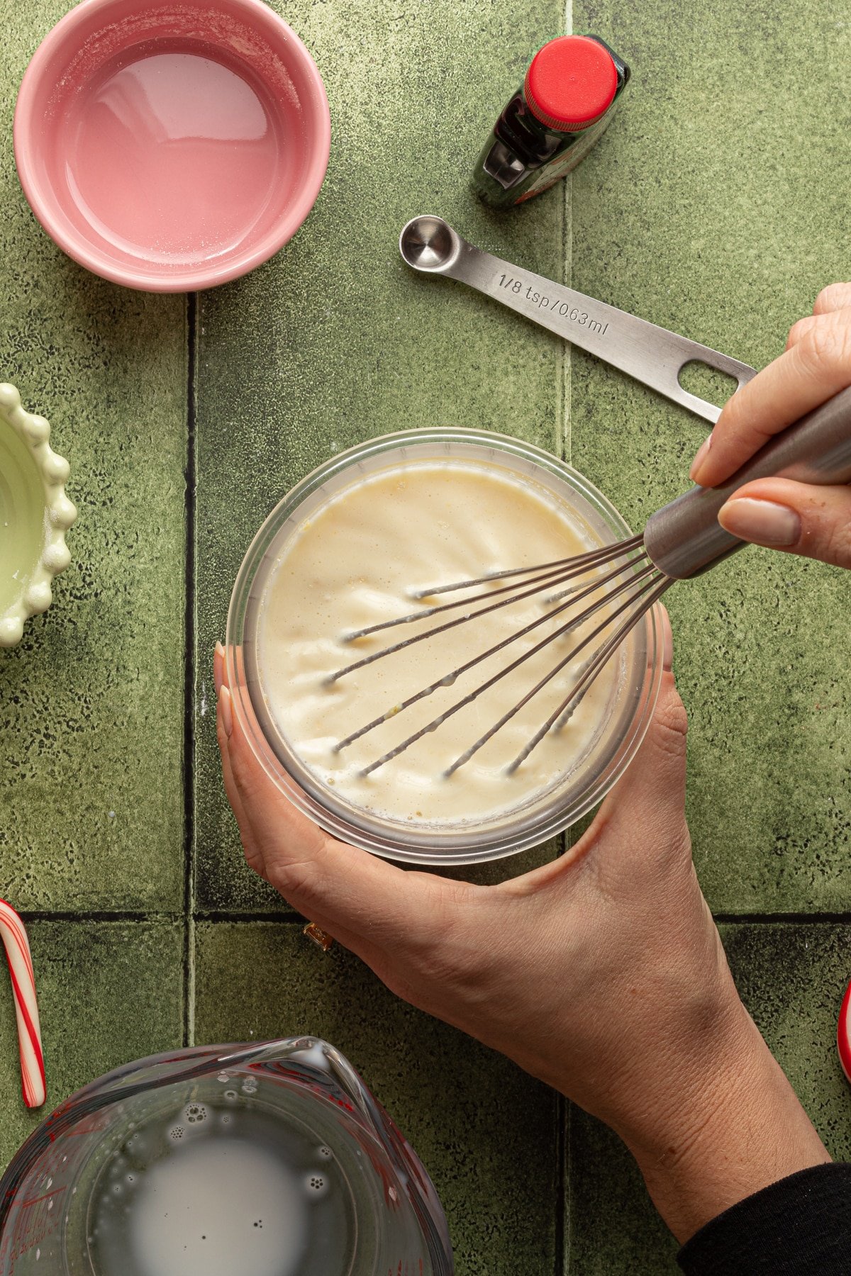 Ninja Creami peppermint ice cream ingredients being whisked in the pint container.