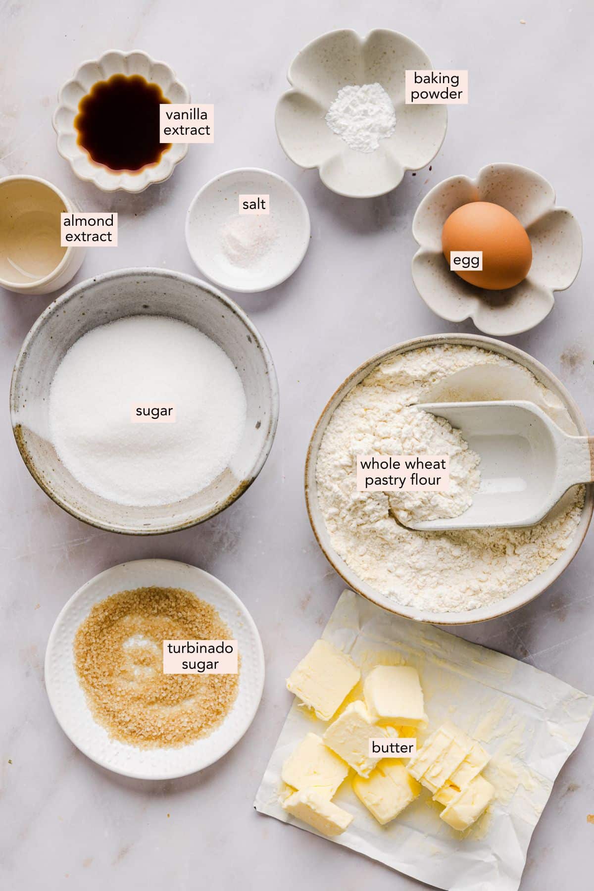 Ingredients for whole wheat sugar cookies in individual bowls.