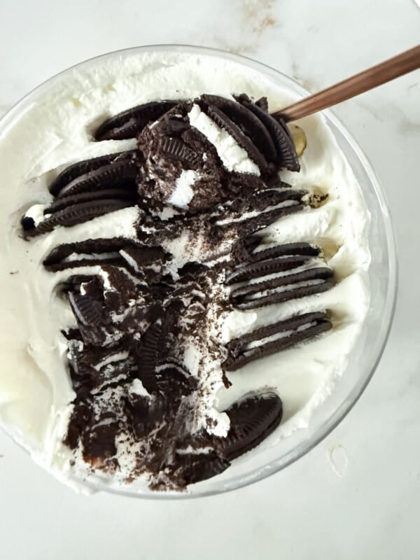 2 ingredient yogurt cheesecake being scooped out with a spoon.