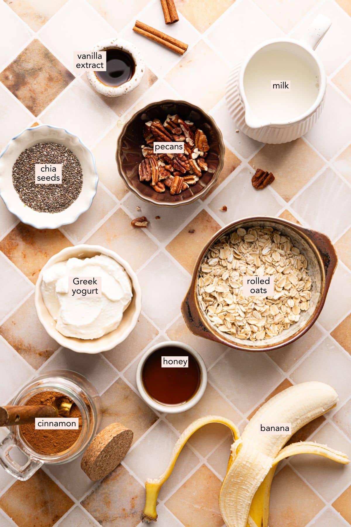 Ingredients for banana bread overnight oats on a countertop with labels.