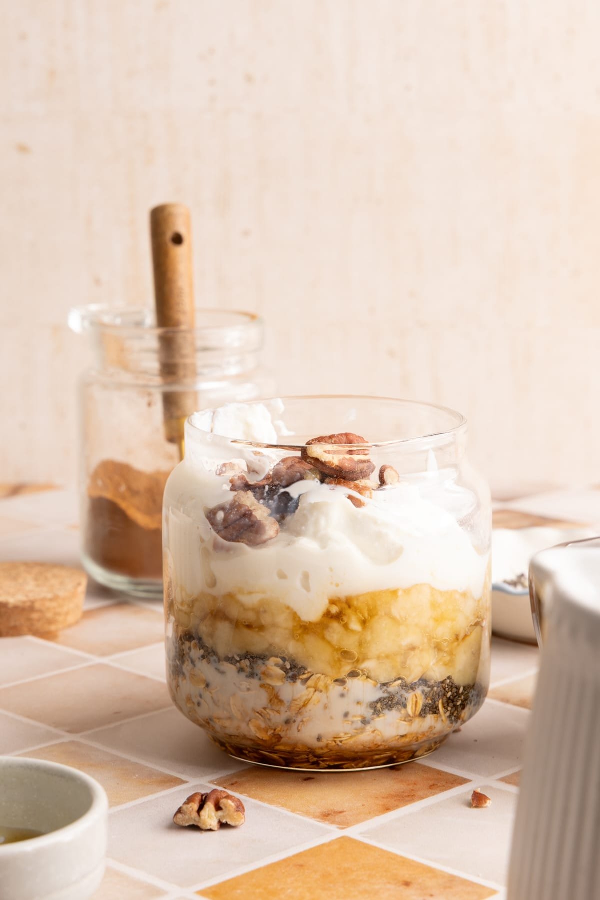 Banana bread overnight oats ingredients in a jar.