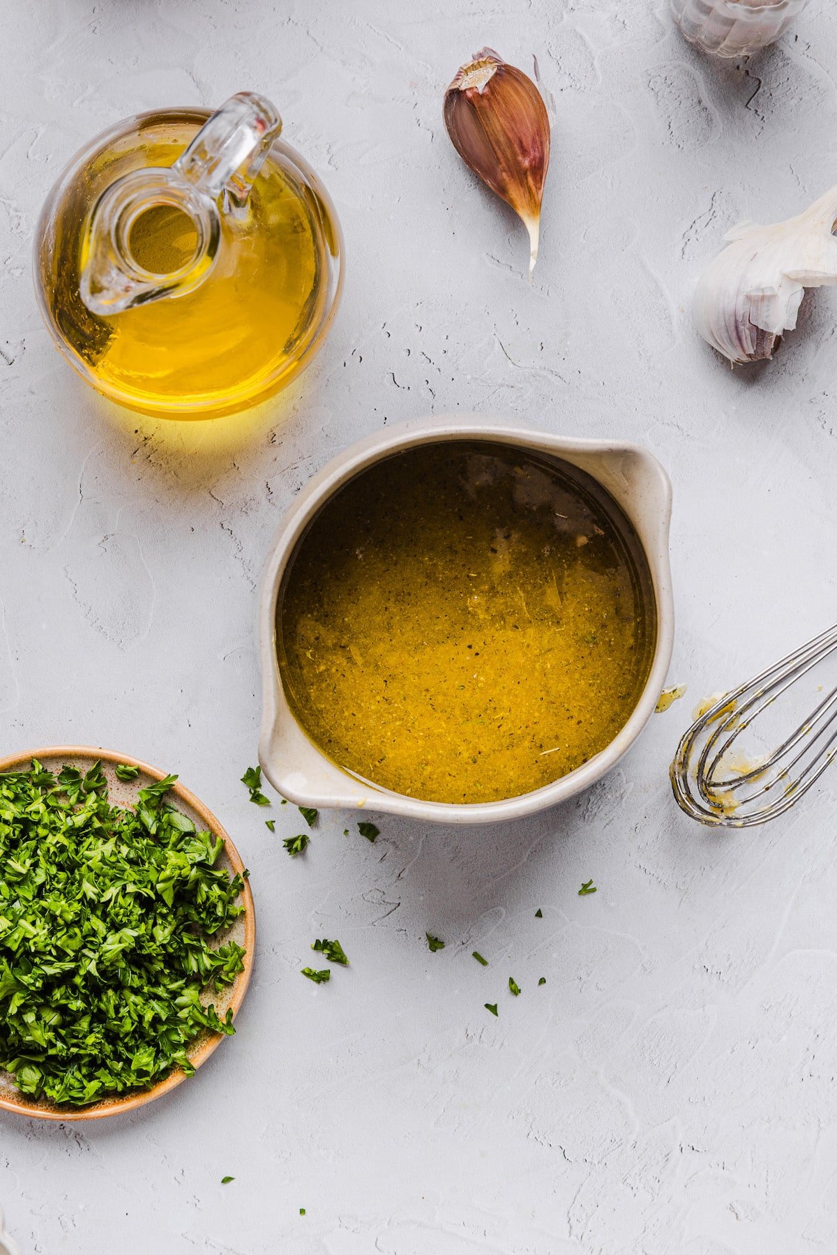 Italian grinder dense bean salad dressing in a dish.