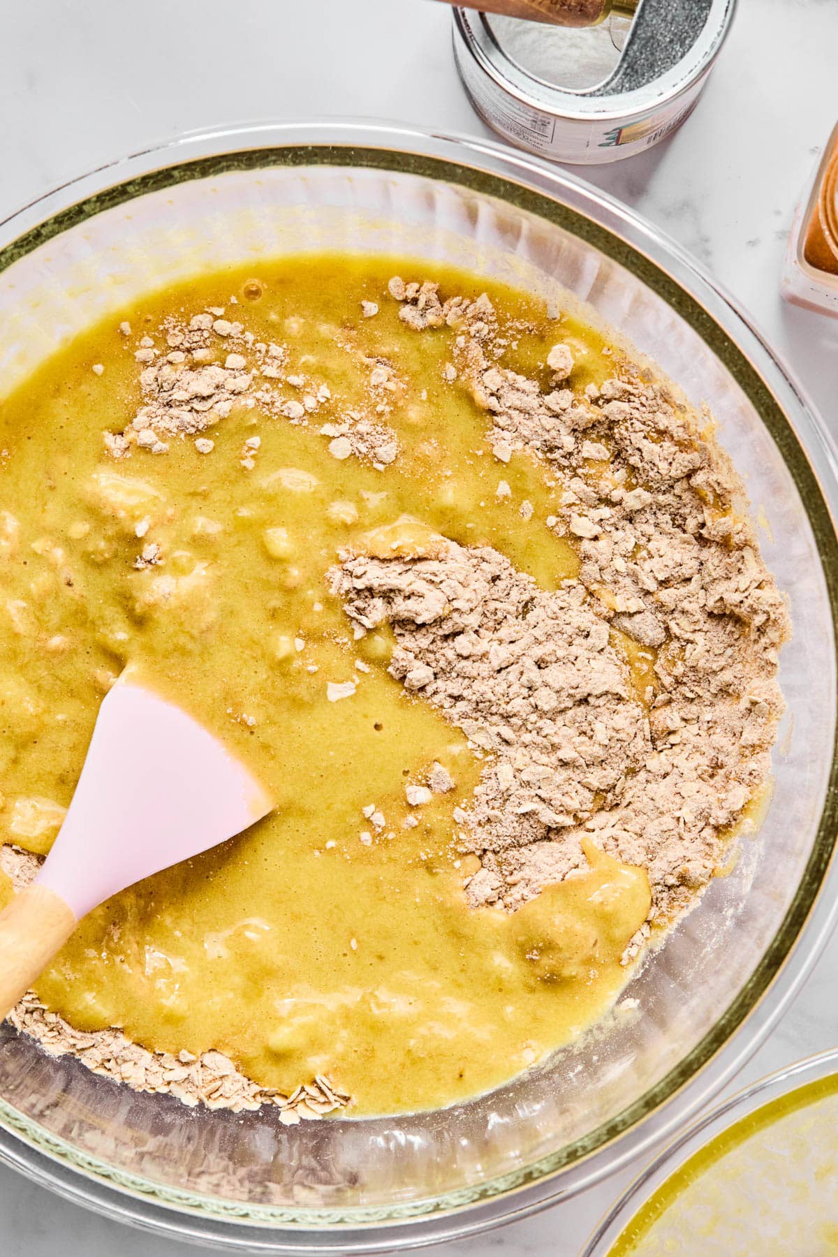 The wet batter in the bowl with the dry ingredients.