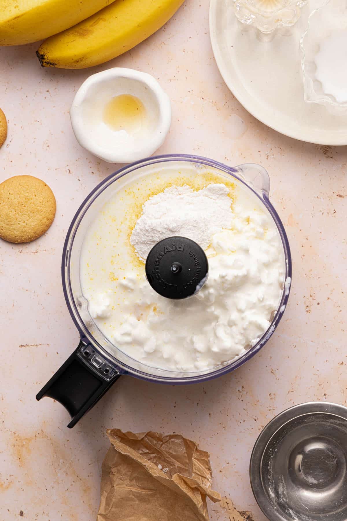 All of the ingredients for cottage cheese banana pudding in a food processor bowl before blending.