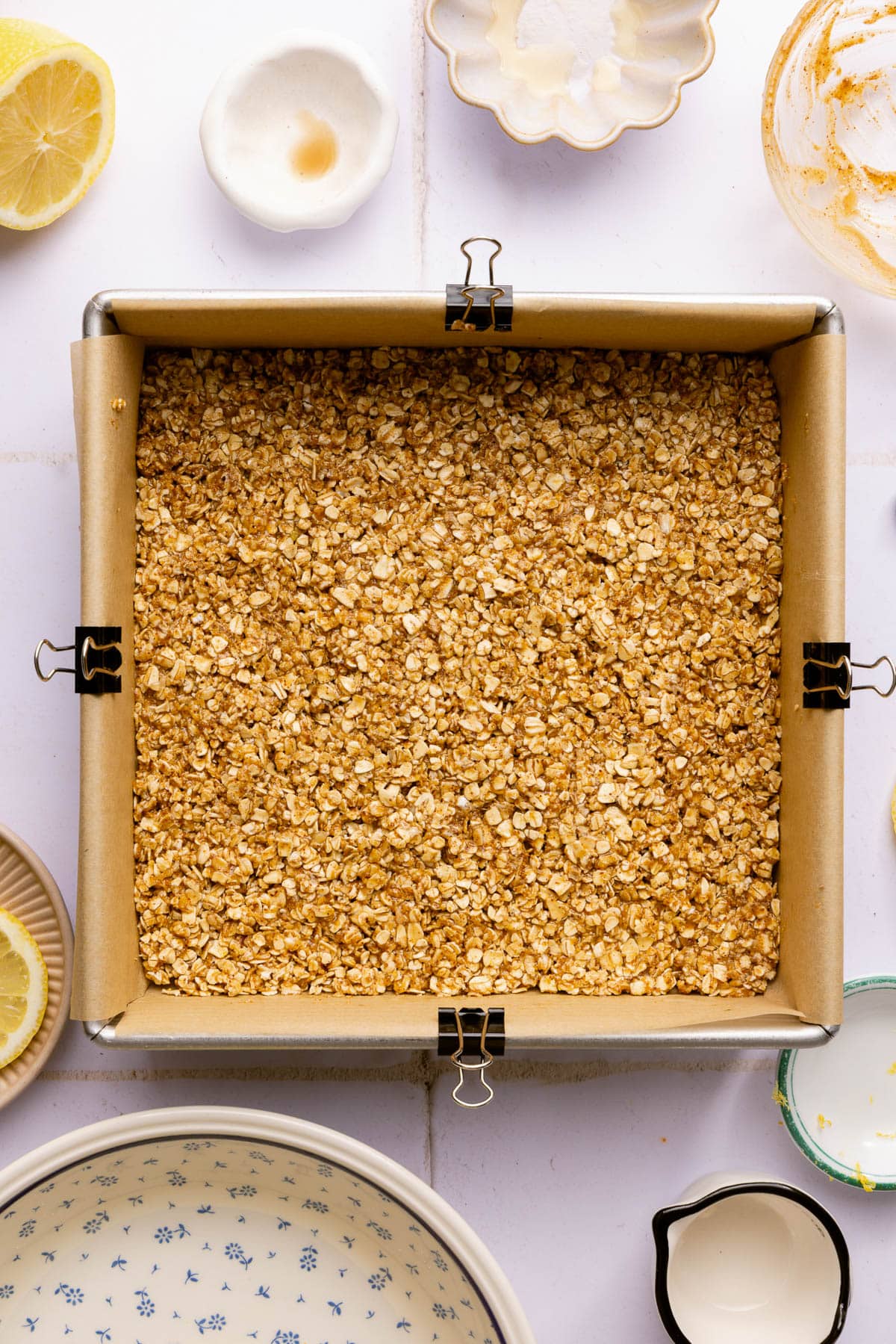 The crumble oat mixture pressed into the bottom of the pan.
