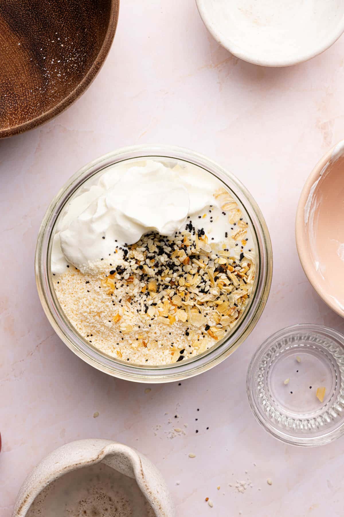 All of the ingredients for the overnight oats in a container before mixing (except for the toppings).