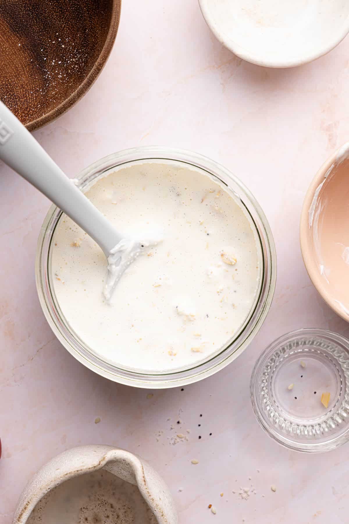 The overnight oats mixture mixed together in the container before chilling overnight.