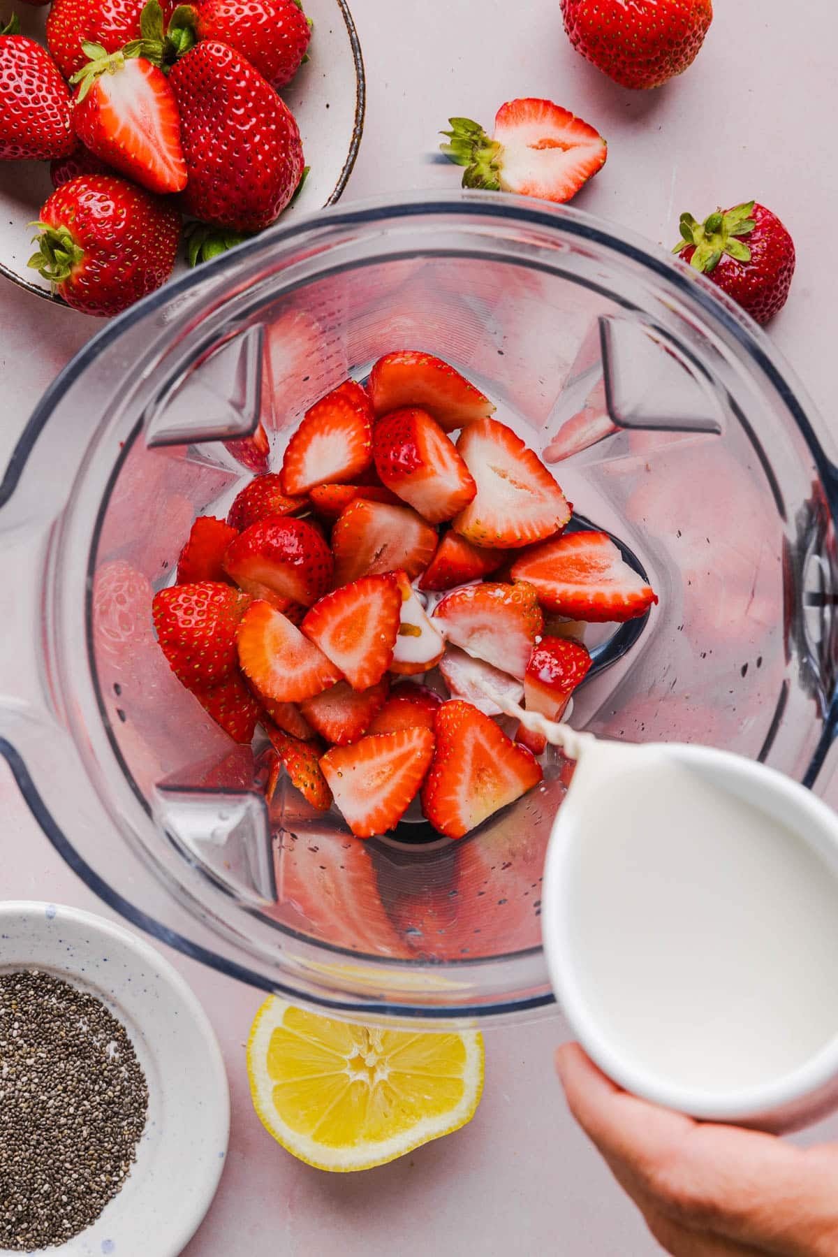 All of the ingredients for the pudding mixture, except the chia seeds, in the blender before blending.