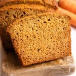Slices of zucchini carrot bread on a cutting board.